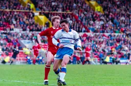 Paul Telfer gets past his man