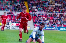 Chris Kamara on his knees