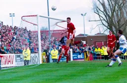 Swindon defender clears his lines