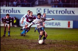 Phil Gray slotting home the penalty after Julian Dicks handballs on the line