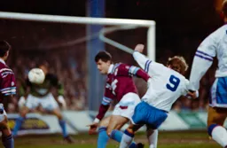 John Hartson heads for goal
