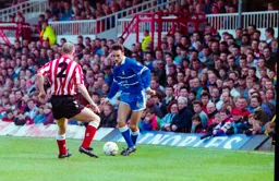 Scott Oakes about to take on defender