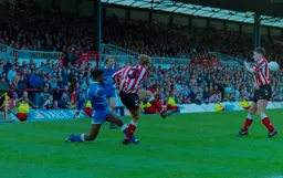 Martin Williams beaten to the ball