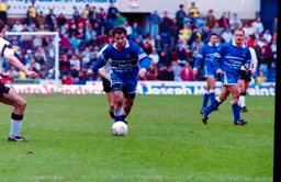 Phil Gray drives forward