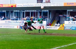 Phil Gray with a flying header