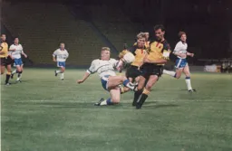 Scott Houghton lunges in on David Holdsworth