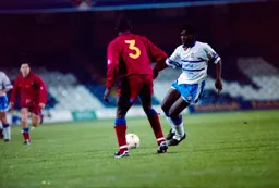 Martin Williams finds Chris Powell in his way