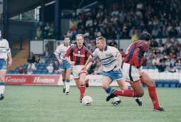 Scott Houghton moves forward to start an attack