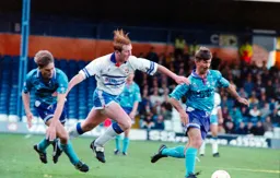 John Hartson runs at the defence