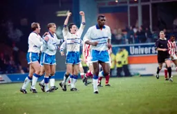 Ceri Hughes leads the celebrations after scoring the Town`s second goal