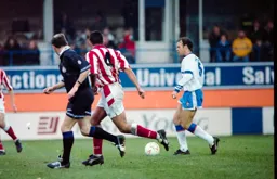 Trevor Peake brings the ball into midfield