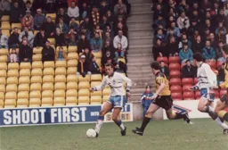 Des Linton looks to find Paul Telfer with a pass