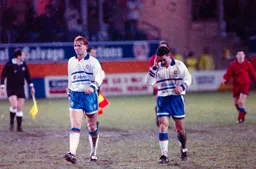 John Hartson and Paul Telfer are their way off at half time