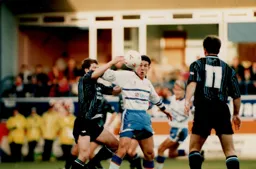 A Derby defender appears to use his hand to knock it away from Paul Telfer