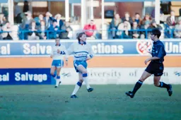 Alan Harper clears the ball forward