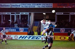 John Hartson with a powerful header