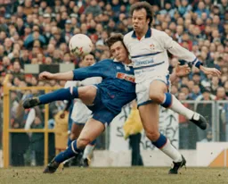 Trevor Peake in a tussle for the ball