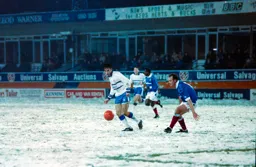 Scott Oakes keeps control of the ball