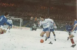 Kerry Dixon ploughs his way through the snow