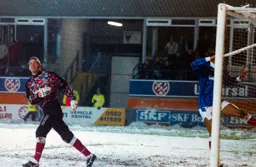 Pompey Keeper watches the ball clear everything and sail in the net