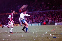 Paul Telfer moves through the rubbish