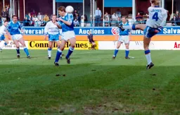 Julian James trys a long range shot at goal