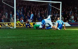 Paul Telfer forces the ball over the line