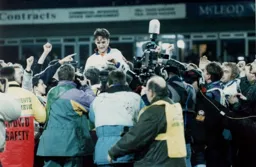 Enthusiastic fans lift Scott Oakes shoulder high