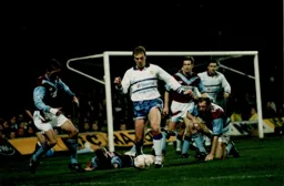 Kerry Dixon leaves two defenders grounded