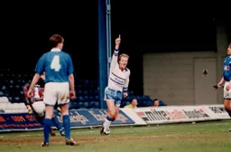 Kerry Dixon arm raised salutes his and Town`s first goal