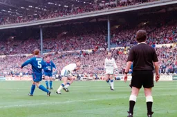 Julian James stoops to get in header on goal