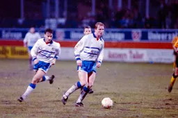 John Hartson looks to take the ball forward