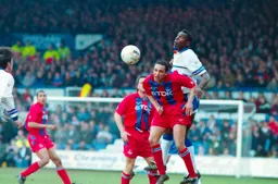 Mitchell Thomas gets his head to the ball first