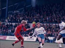 Alan Harper plays a side foot pass