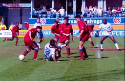 Ceri Hughes surrounded