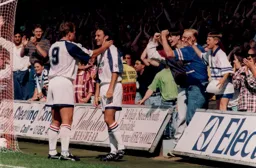 Scott Oakes is congratulated after heading in the equaliser
