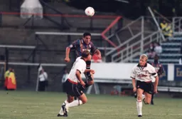 Paul Telfer heads the ball on