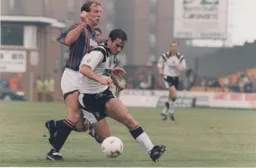 Kerry Dixon gets close to a Vale defender