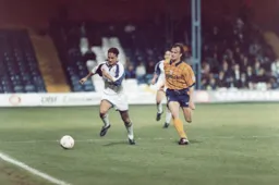 Scott Oakes in a race for the ball