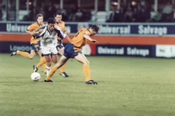 Paul Telfer weaves hsi way through the Bolton rearguard