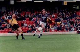 Kerry Dixon in a search for the ball
