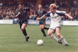 Gary Waddock plays the ball forward