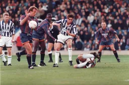 The ball flashes past everyone