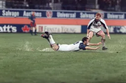 Scott Oakes celebrates with a water slide