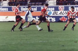 Scott Oakes manages to get in a shot