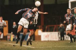 Paul Telfer gets his head to the ball