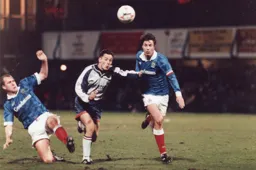 Jamie Woodsford gets the better of the Pompey defenders