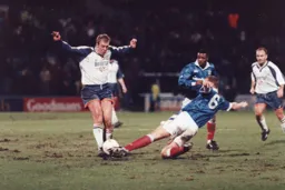 Kerry Dixon blocks a clearance