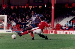 Mitchell Thomas battles for the ball