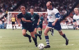 Gavin Johnson gets away from Leicesters's Colin Hill